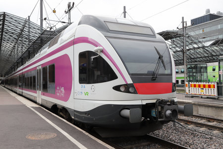 Helsinki, Finland - September 5, 2023: Commuter train class Sm5, Stadler Flirt at Helsinki Central station, in service for HSL operated by VR for the Helsinki area.のeditorial素材