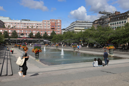 Stockholm, Sweden - August 31, 2023: People in the Stockholm downtown public park Kungstradgarden.のeditorial素材