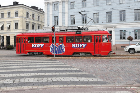 Helsinki, Finland - September 5, 2023: View of the mobile pub Sparakoff, a converted tram, at the market square area.のeditorial素材
