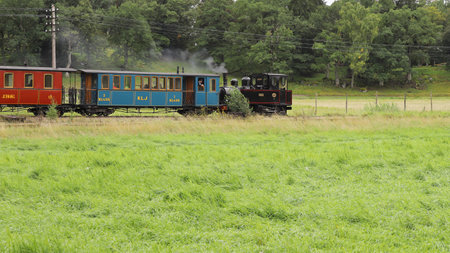 Mariefred, Sweden - September 2, 2023: Historic steam train at the Ostra Sodermanlands railroad museum.のeditorial素材
