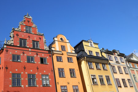 Low angle view of the old town buildings facades.の写真素材