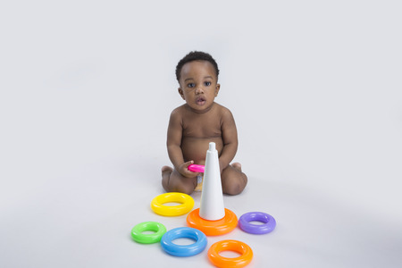 baby boy playing with toysの写真素材