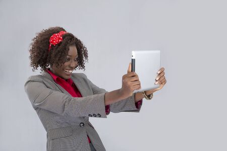 portrait of a businesswoman looking at a digital tablet.の写真素材