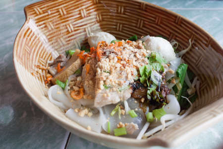 Thai noodle with pork-ball, pork and dried salted prawnの写真素材