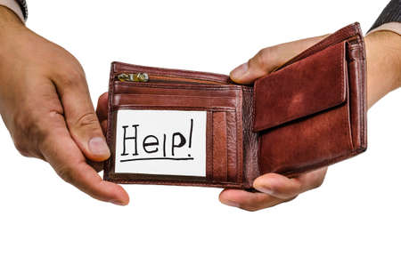 leather wallet with a note in a man's hand on a white background insulatingの写真素材