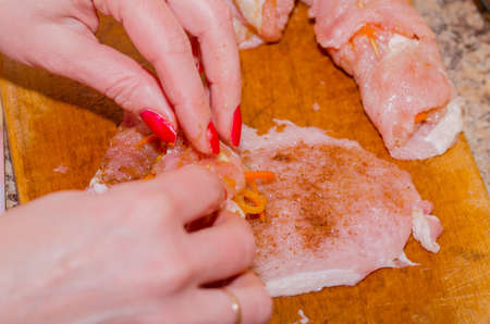 cooking delicious meatloaf stuffed at home with their own handsの写真素材