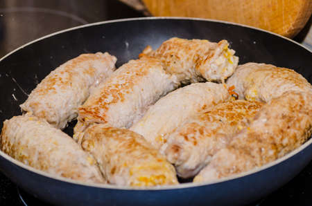 cooking delicious meatloaf stuffed at home with their own handsの写真素材