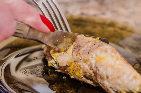 cooking delicious meatloaf stuffed at home with their own handsの写真素材