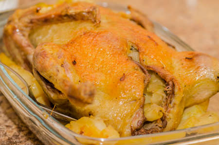 Duck cooked in a home with a crispy brown crust on a feast for gourmetsの写真素材