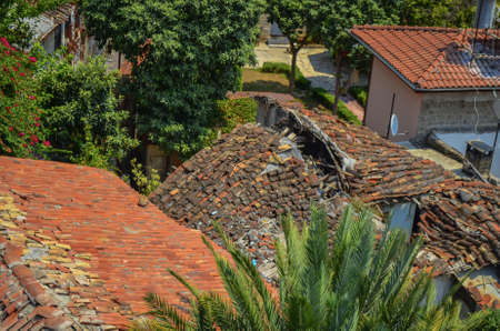 The roofs of the old houses of the city from the red tiles found in the tour of Antalyaの写真素材