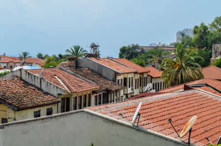 The roofs of the old houses of the city from the red tiles found in the tour of Antalyaの写真素材