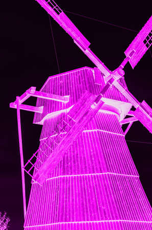 windmill village windmill with large blades unusual neon purple for entertainment and funの写真素材