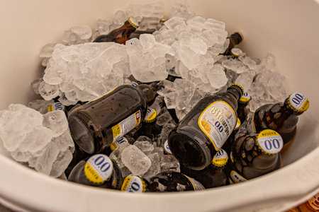 Beek, South Limburg, Netherlands. September 15th. 2019. Bottles of Bitburger Non-Alcoholic Beer 0.0 in an ice bucket at a family event, refreshing drink on a hot summer dayのeditorial素材