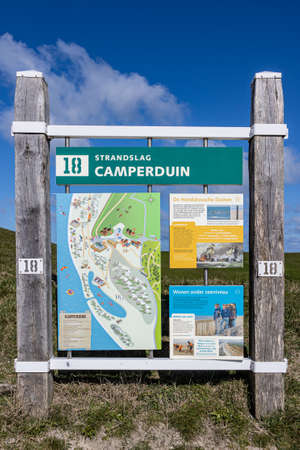 Camperduin, North Holland, Netherlands. Apr 12th. 2021. Information signs: Name of the beach Camperduin. Welcome to Schoorlse and Hondsbossche dunes. Living below sea levelのeditorial素材