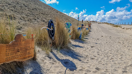 Petten aan Zee, North Holland, Netherlands. April 17, 2021. The Wall of Shame, an open-air gallery conceived by Arnold Gronert, art made from trash collected on the beachのeditorial素材