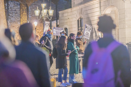 Maastricht, South Limburg, Netherlands. March 8, 2022. International Women's Day. Speeches, demonstration and march against abuse of woman, gender violence and for female rights on the Vrijthofのeditorial素材