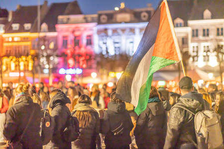 Maastricht, South Limburg, Netherlands. March 8, 2022. International Women's Day. Speeches, demonstration and march against abuse of woman, gender violence and for female rights on the Vrijthofのeditorial素材