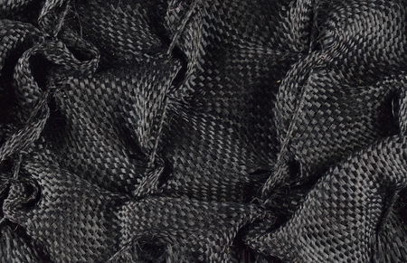 black texture background of cloth fabric detail close upの写真素材
