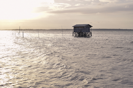 old fishing house on the beachの写真素材
