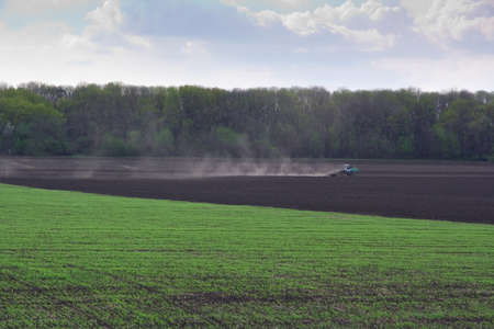 Tractor working on a field.