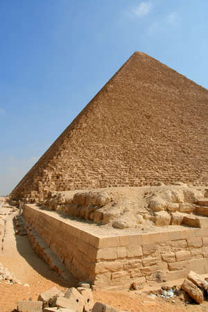 Egyptian pyramid on sky background