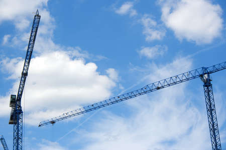 Two cranes on sky backgroundの写真素材
