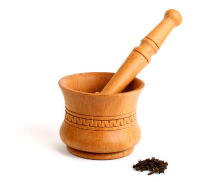 Wooden mortar isolated on whiteの写真素材