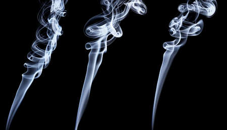 White smoke on black backgroundの写真素材