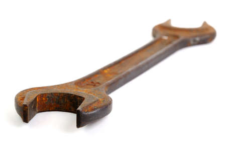 Old wrench isolated on whiteの写真素材