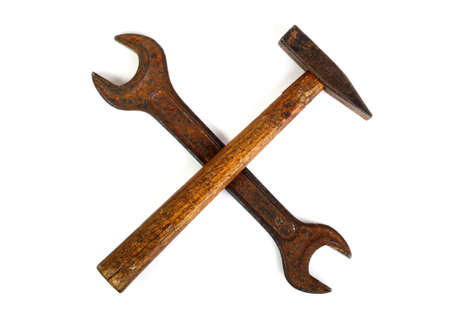 Crossed wrench and hammer on white backgroundの写真素材