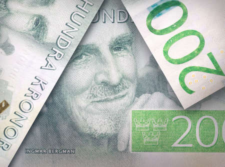 Money bills stacked over each other forming a money triangle.の写真素材