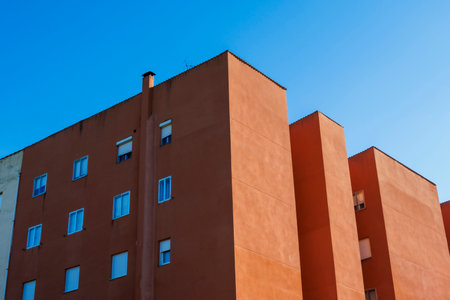 Modern apartment buildings on a sunny day with a blue sky. Facade of a modern apartment buildingの写真素材