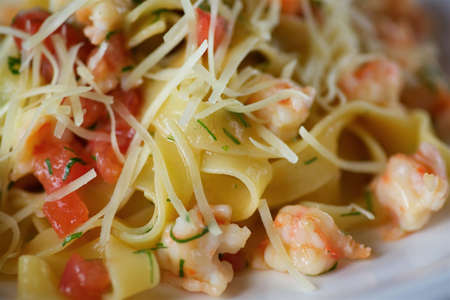 Pasta with cheese and seafood. Shrimp and parmesan. Italian food.の写真素材