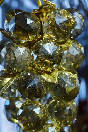Crystal clear pendants as decoration to decorate the item. The suspension reflected in the glass. Close up of the subject.の写真素材