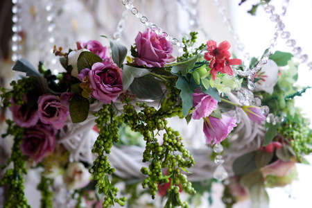 The composition of artificial flowers, imitating a real bouquet. Used for decoration and interior design.の写真素材