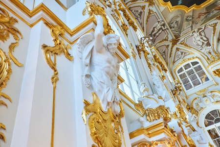 St. Petersburg, Russia - May 27, 2021: Hermitage Museum, sculptural composition on the wall of the palace. Chic palace interior details.のeditorial素材