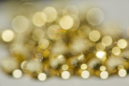 Bokeh Vibrant Yellow Background With Blurry Lightsの写真素材