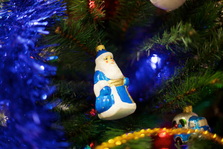 Elegant decorated with balls and figures Christmas tree with a beautiful design.の写真素材