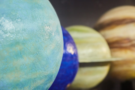 Layout of astronomical objects-planets of the solar system. Balls for studying astronomy. Saturn,...