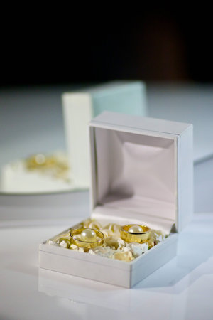 Wedding rings in a beautiful design. The concept of a wedding or engagement