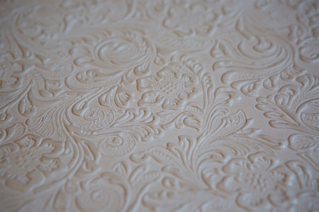 The texture of the material is white genuine leather with a pattern as a background image for the design.の写真素材