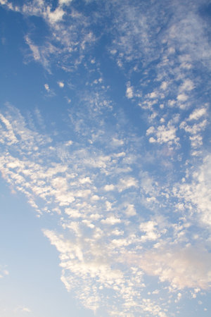 The texture of the clouds against the blue sky