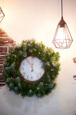 Christmas wreath on the wall. Interior decoration for the holiday.の写真素材