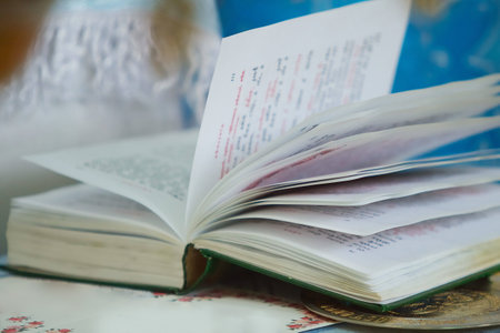 A priest holding a Bible