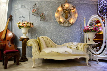 The interior of the room is in vintage style. Lots of antique items.の写真素材