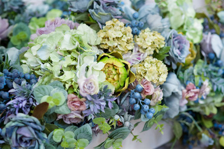 The composition of artificial flowers, imitating a real bouquet. Used for decoration and interior design.の写真素材