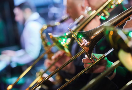 The musical instrument is a trumpet in the hands of a musician. Symphony Orchestra. The concept of culture and art.の写真素材