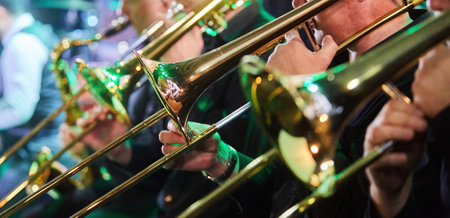 The musical instrument is a trumpet in the hands of a musician. Symphony Orchestra. The concept of culture and art.の写真素材
