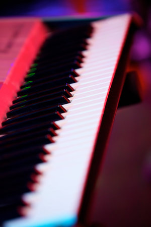 Electronic keyboard musical instrument synthesizer. Close-up of black and white keys. The concept of culture and art.の写真素材