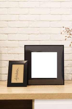White picture frame with decorations. Mock up for your photo or text. Place your work, print art,...